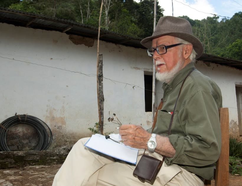The mycologist Gastón Guzmán examining mushrooms in the field near Huautla de Jiménez, 2013.