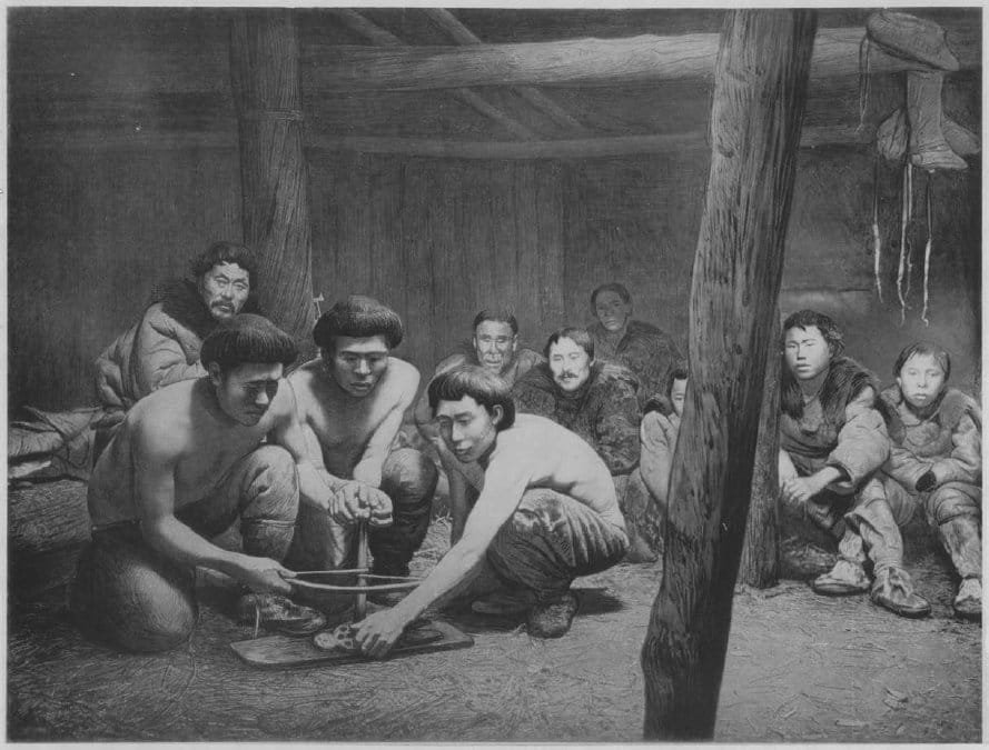 A 1905 photograph of Koryak men gathered at the ceremony of starting the New Fire.