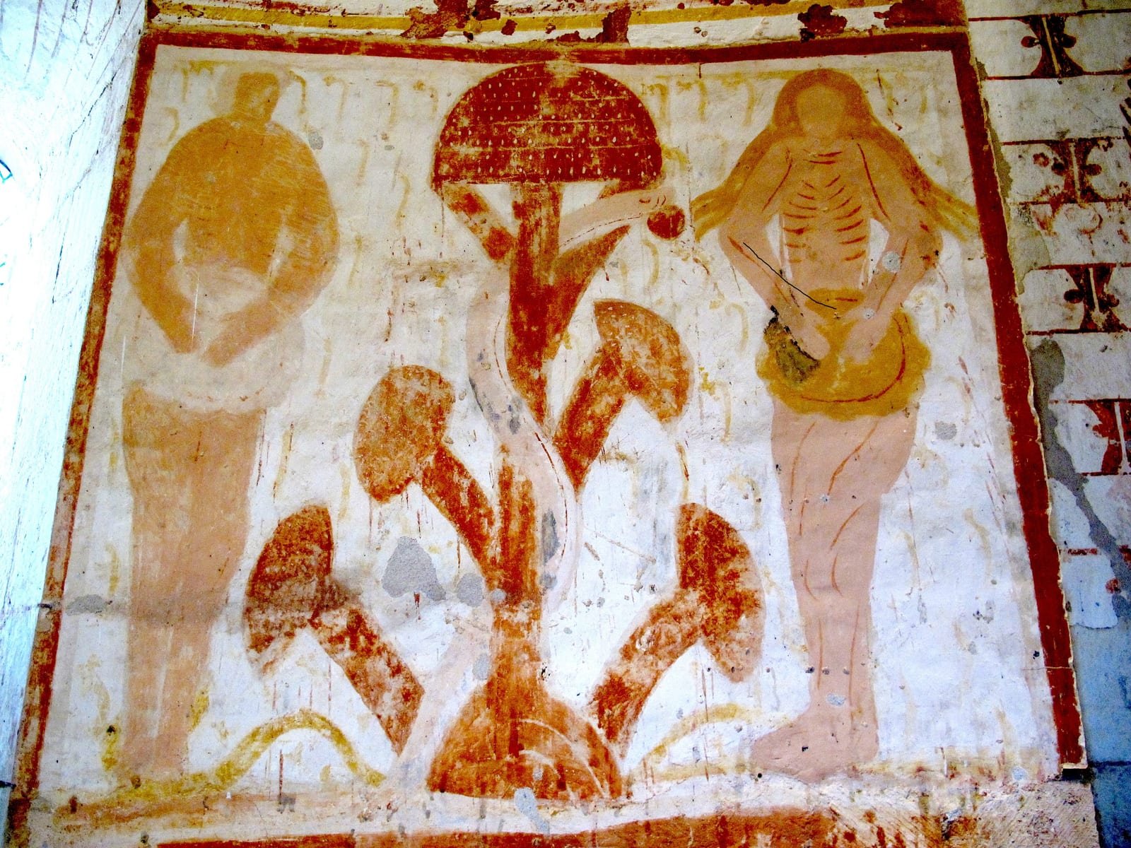 A medieval fresco of Adam and Eve beside a Tree of Knowledge shaped like a giant red-and-white Amanita muscaria mushroom.
