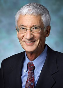 A portrait photograph of the psychopharmacologist Roland Griffiths.