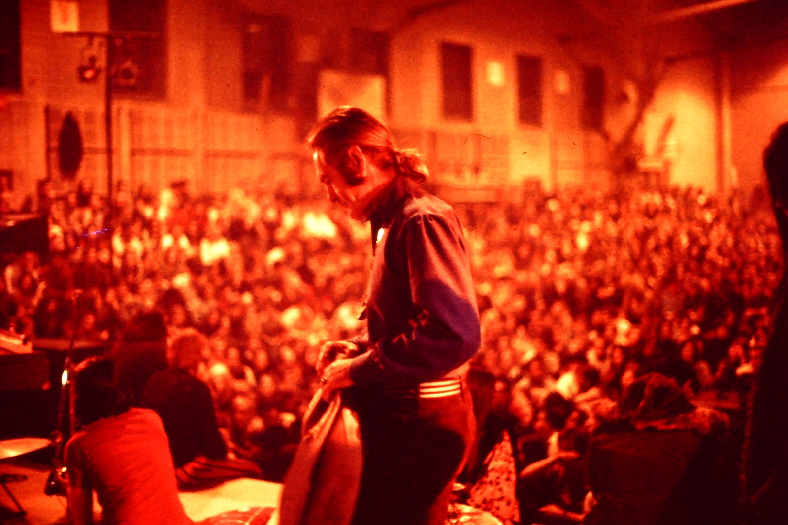 Timothy Leary speaking on stage during a lecture tour in 1969.